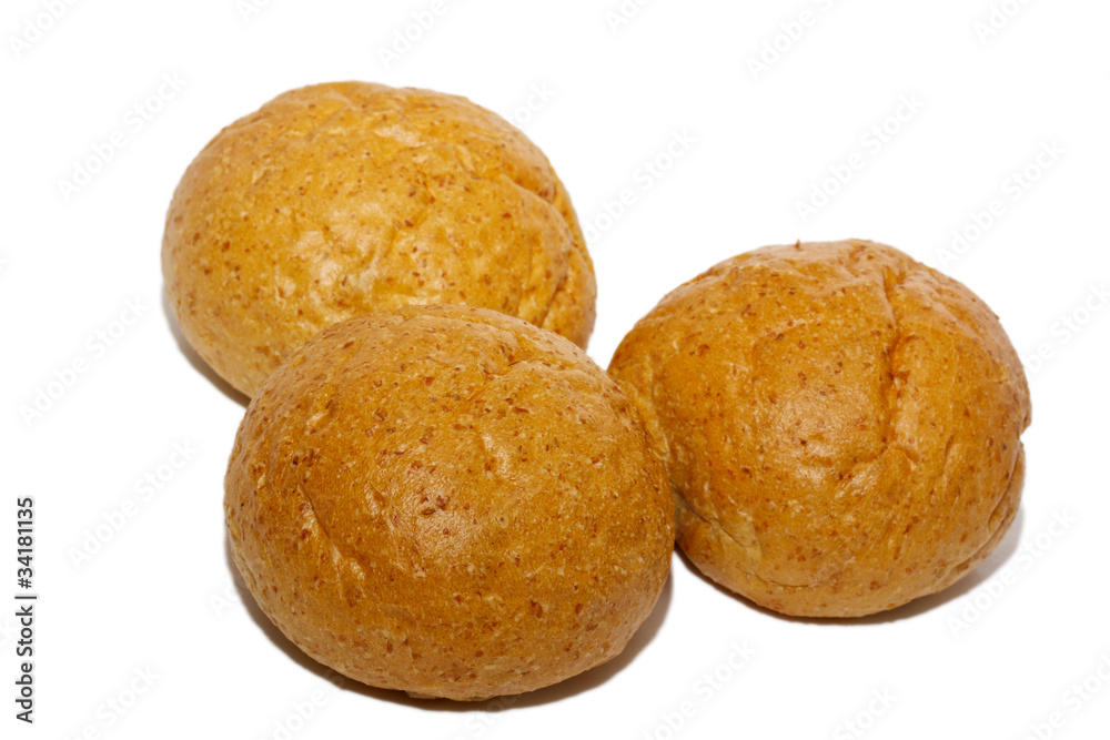 Loaf of bread and rolls isolated on white Loaf of bread and rolls isolated on white