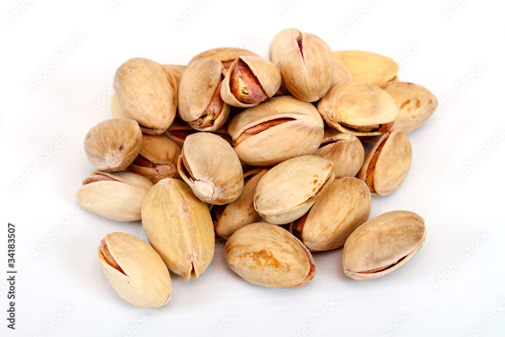 Close-up image of pistachios studio isolated on white background Close-up image of pistachios studio isolated on white background