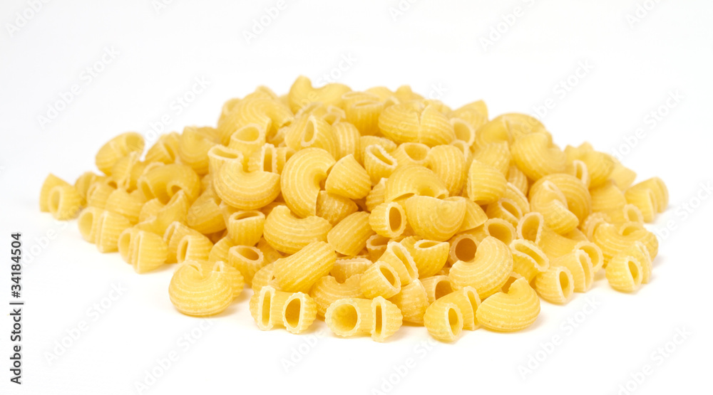 close up of a dried italian pasta on white background close up of a dried italian pasta on white background