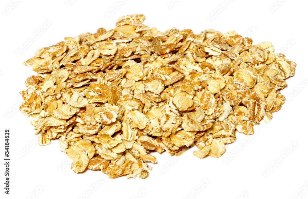 Heap of dry rolled oats isolated on white background Heap of dry rolled oats isolated on white background