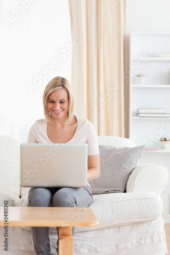 Portrait of a woman using a laptop