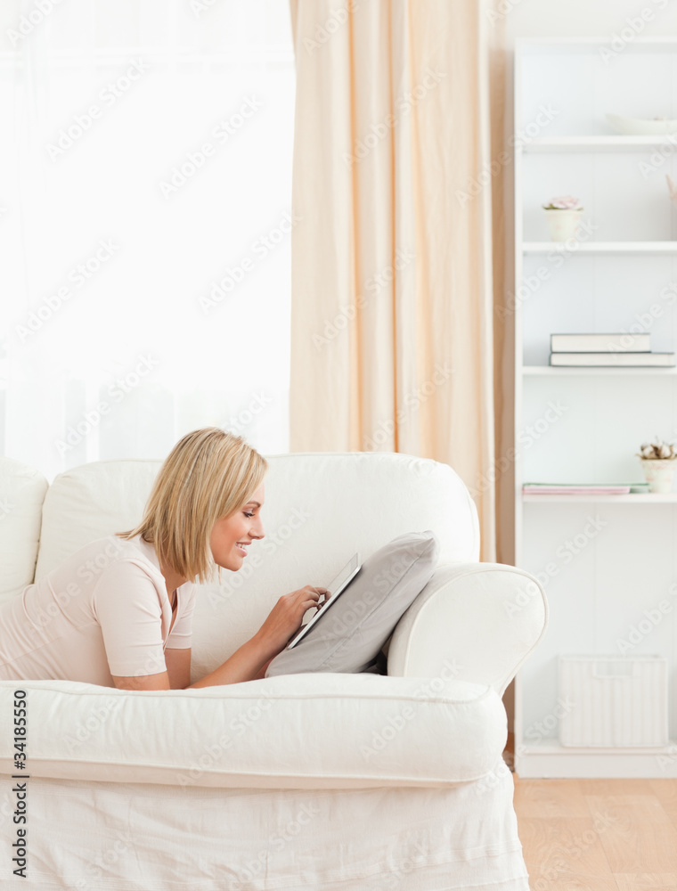 Portrait of a charming woman using a tablet computer Portrait of a charming woman using a tablet computer