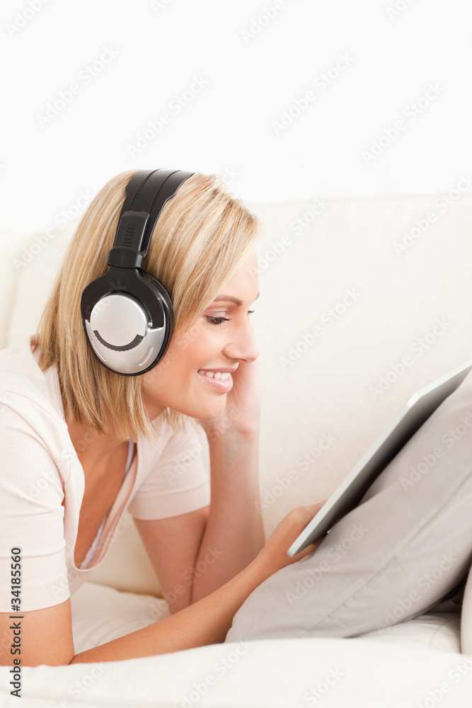 Portrait woman watching a movie with a tablet computer Portrait woman watching a movie with a tablet computer