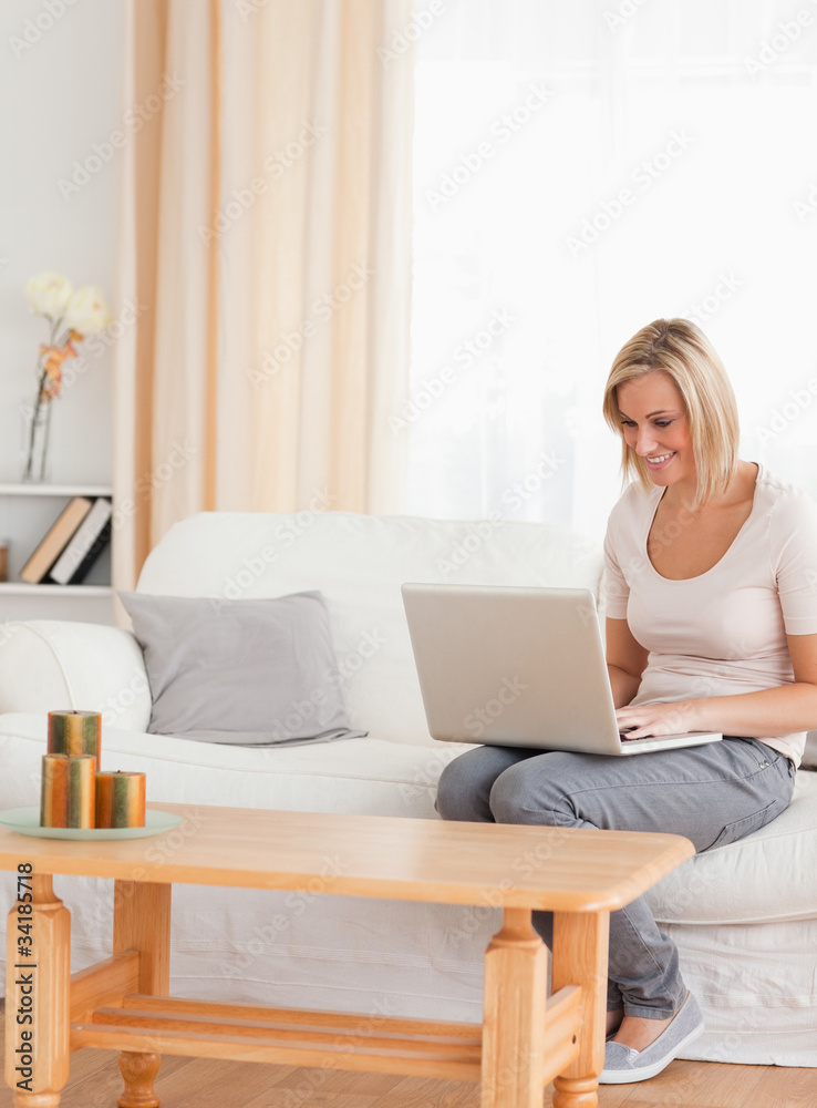 Portrait of a beautiful woman using a laptop Portrait of a beautiful woman using a laptop