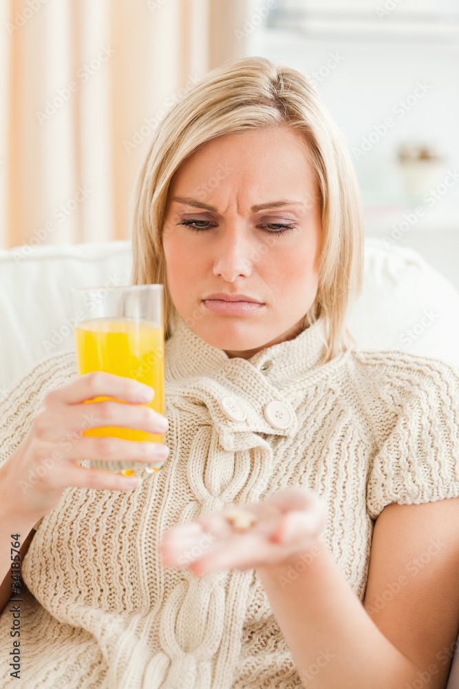 Woman showing pills Woman showing pills