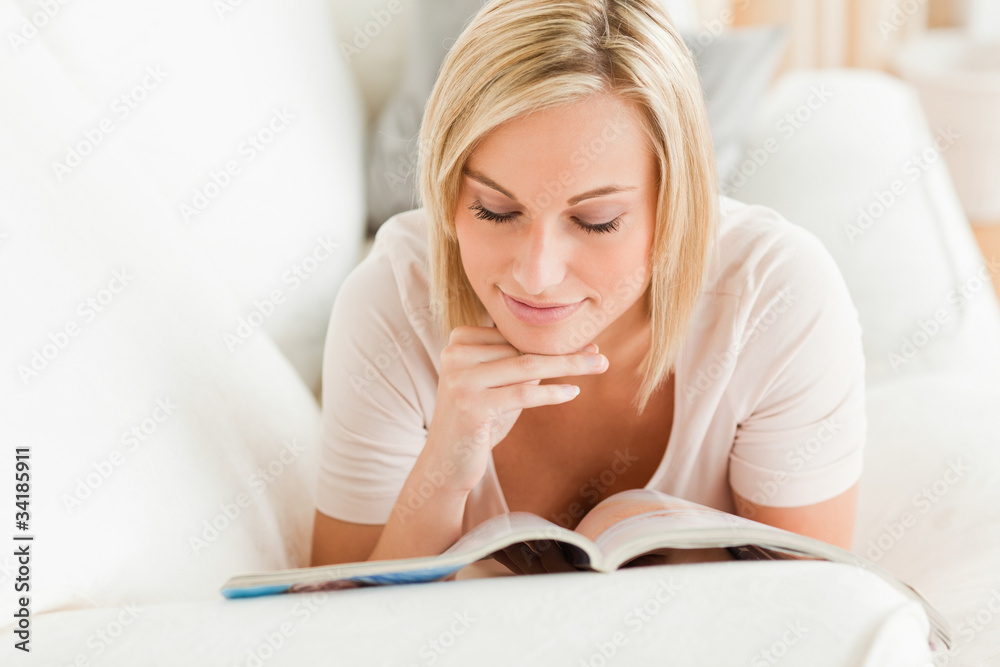 Charming woman reading a magazine Charming woman reading a magazine