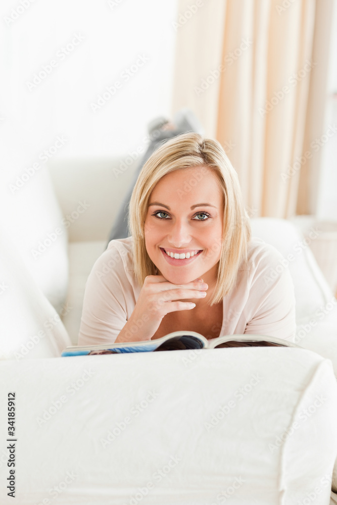 Portrait of a charming woman with a magazine Portrait of a charming woman with a magazine