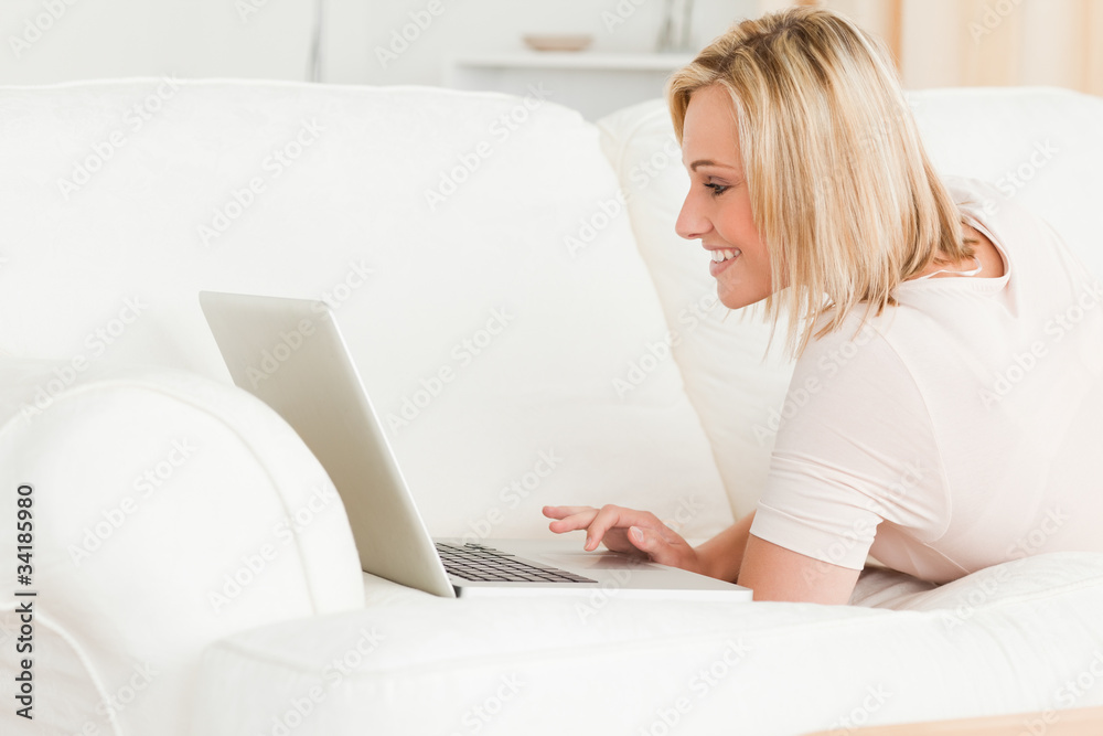 Charming woman using a notebook Charming woman using a notebook