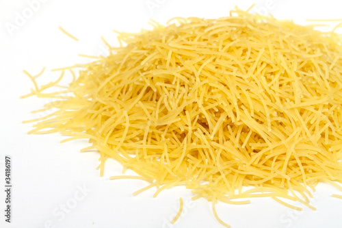 close up of a dried italian pasta on white background