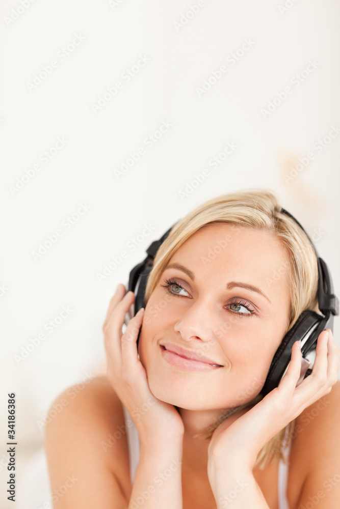Portrait of a calm woman wearing headphones Portrait of a calm woman wearing headphones