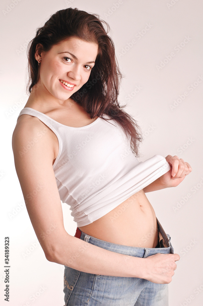 Girl happy with her diet`s results Girl happy with her diet`s results