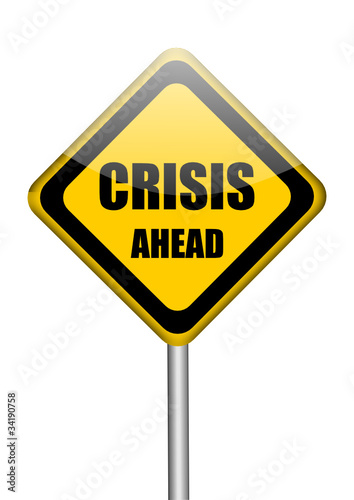 crisis ahead yellow traffic sign