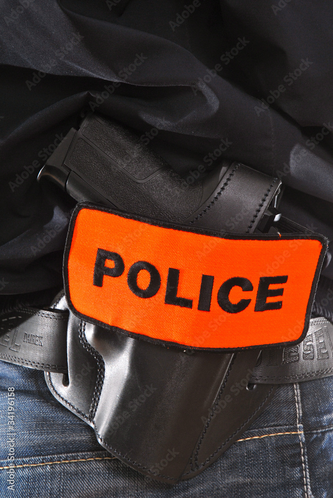 brassard police uniforme policeman pistolet Stock Photo