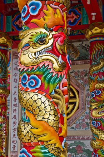 Pole carved with Chinese dragon © Warakorn