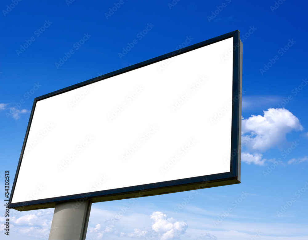 White advertising wall on blue sky White advertising wall on blue sky