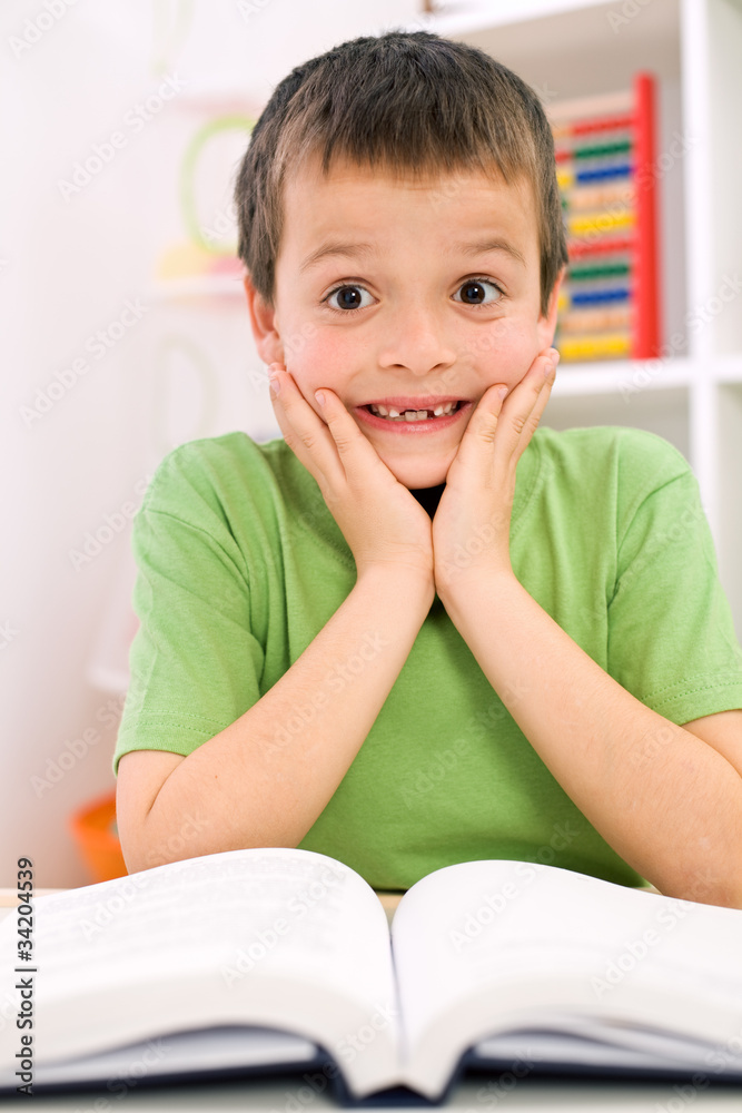 Little boy forgot reading - back to school concept Little boy forgot reading - back to school concept