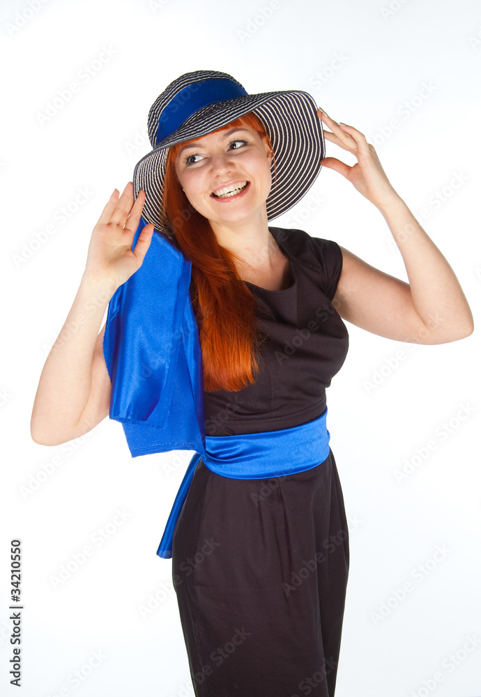Portrait of a beautiful girl in a summer hat.