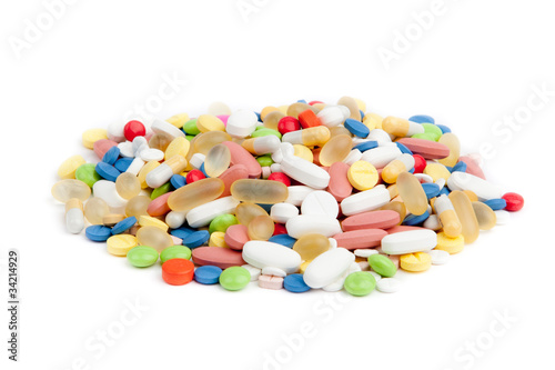 pills over white. Colorful tablets with capsules.