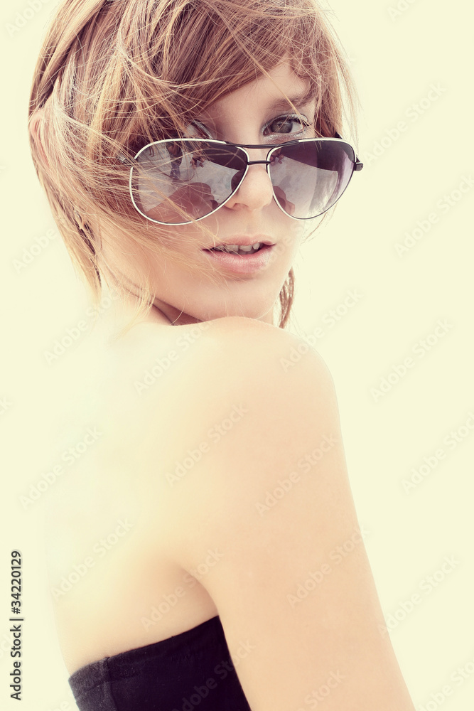 Woman in sun glasses. Fashion summer portrait Woman in sun glasses. Fashion summer portrait