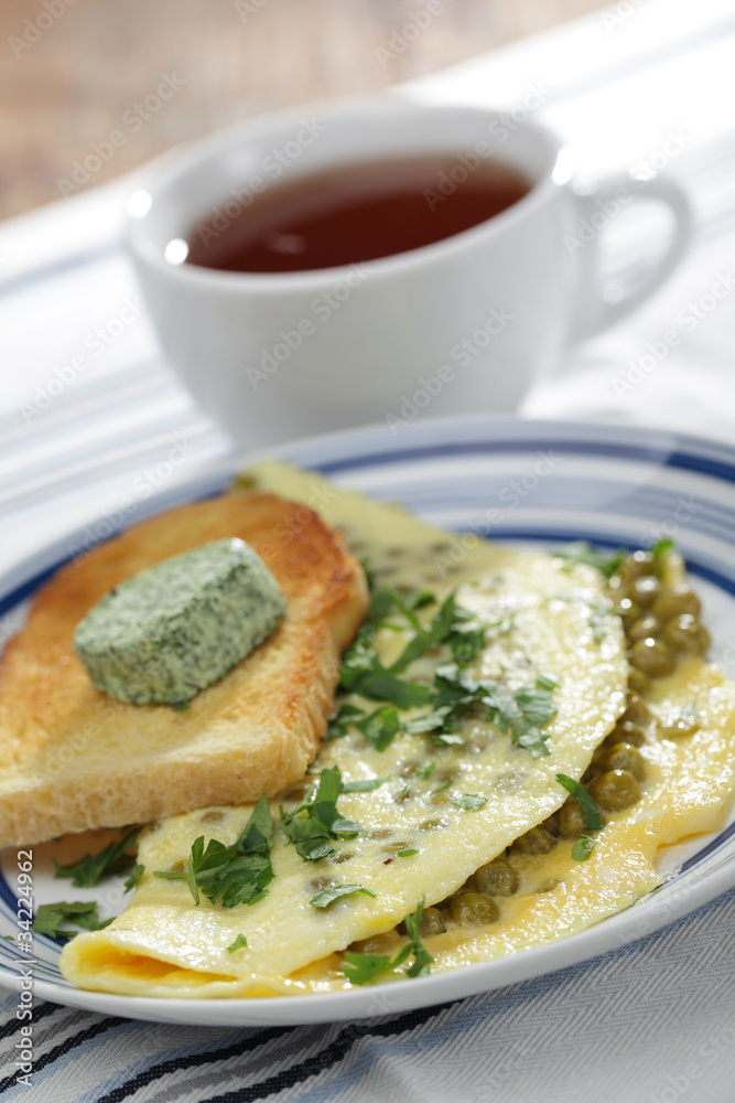 Breakfast with omelet and toast Breakfast with omelet and toast