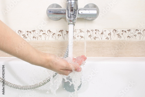 running water and washing hands