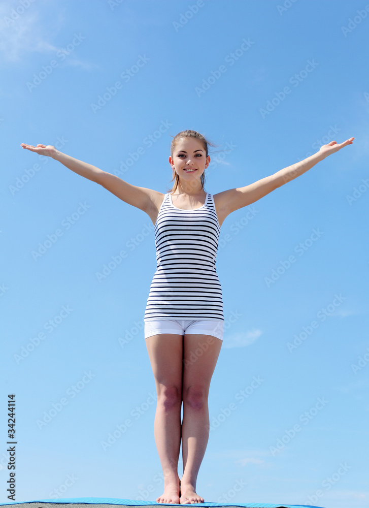 Portrait of a young woman doing exercises Portrait of a young woman doing exercises