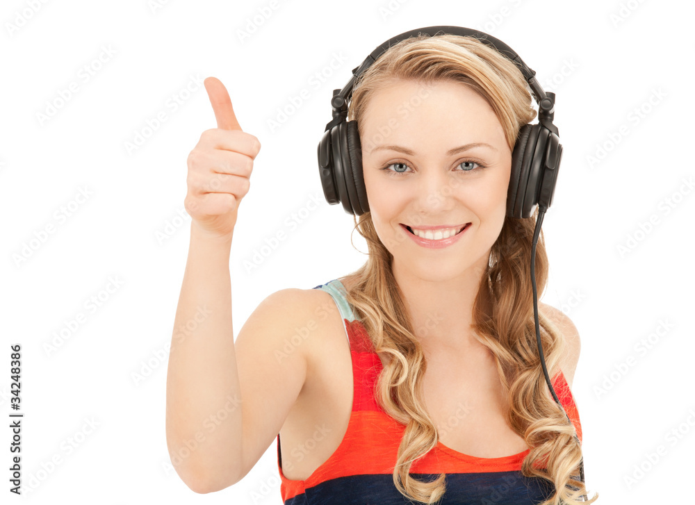 happy teenage girl in big headphones happy teenage girl in big headphones