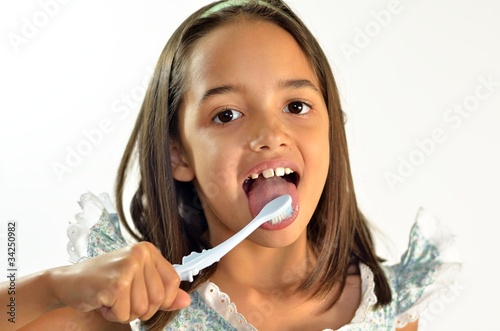 Girl Brushes her Tongue