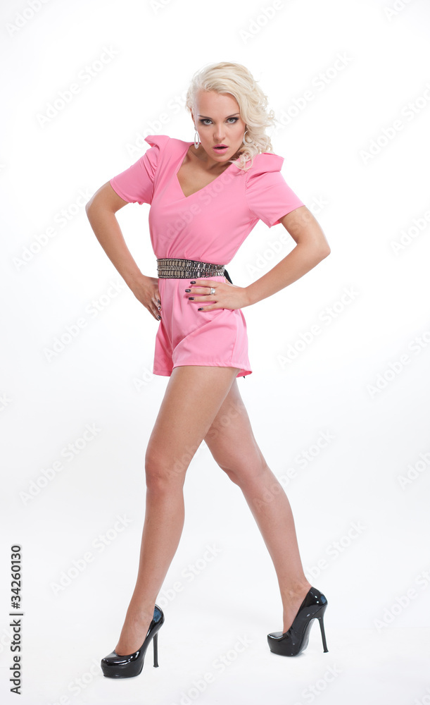 Beautiful blond woman in pink dress Beautiful blond woman in pink dress