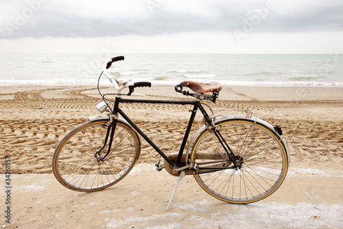 cycling on the beach - bicicletta sulla spiaggia