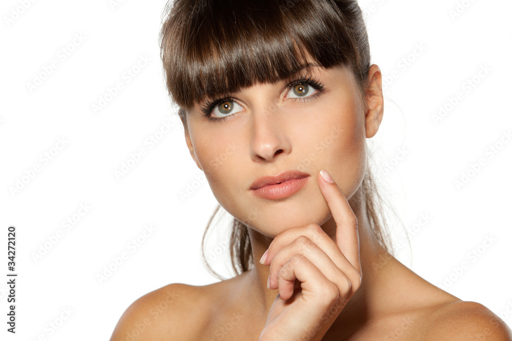 Closeup portrait of pensive female looking upwards Closeup portrait of pensive female looking upwards
