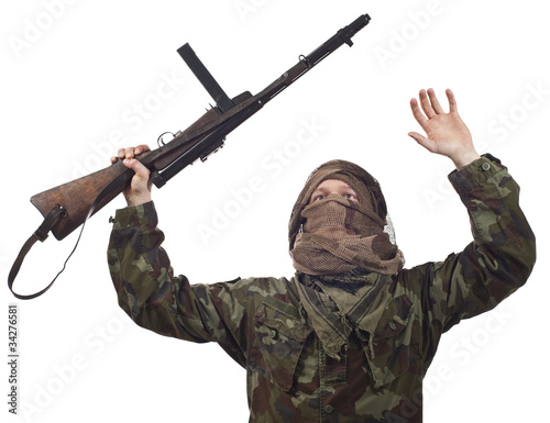 Cuadro en lienzo A camouflaged guerrilla warrior screaming for war.