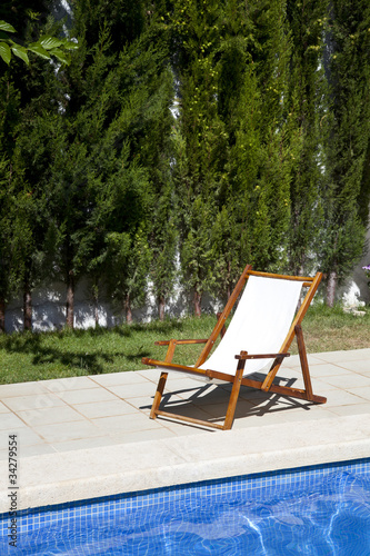 Deckchair in a swimming pool