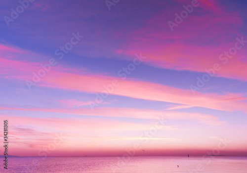 Bright Colorful Sunrise On The Sea With Beautiful Clouds
