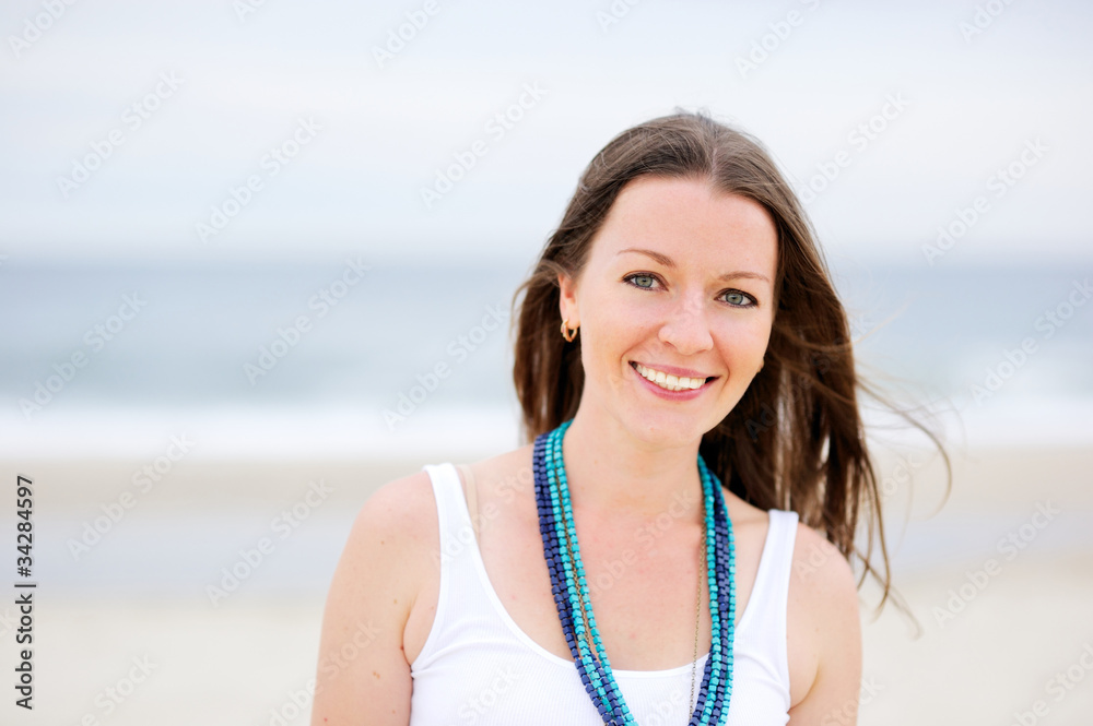Portrait of a beautiful brunette woman with a necklace Portrait of a beautiful brunette woman with a necklace