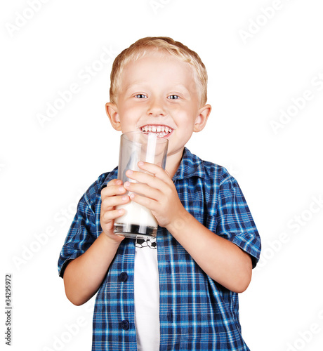 Happy smiling boy portrait with glass of milk