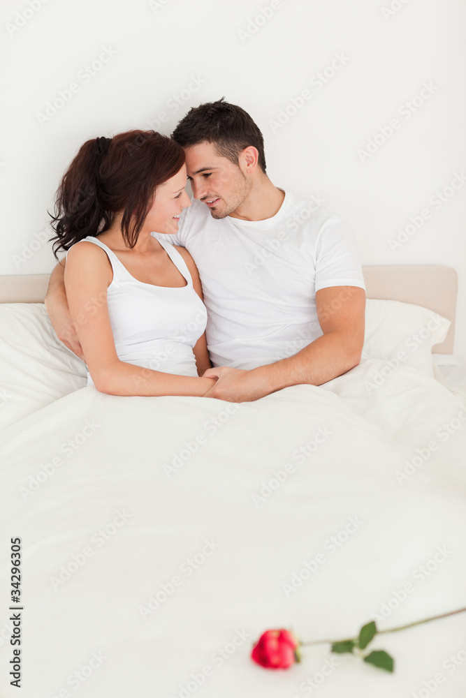 Rose on a bed of delightful couple Rose on a bed of delightful couple