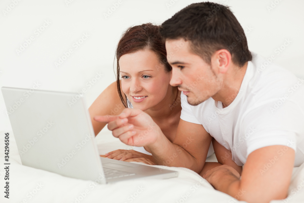 Happy couple with a laptop Happy couple with a laptop
