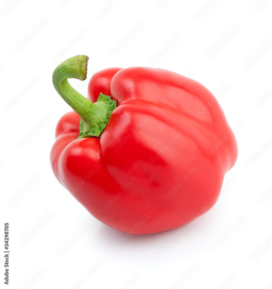 Bright red pepper closeup on a white background . Bright red pepper closeup on a white background .