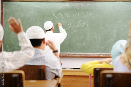 Canvas Print Teacher at classroom writing Ramadan on board
