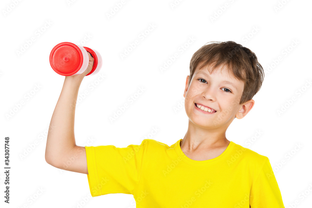 boy raises dumbbell boy raises dumbbell