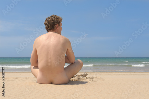 sitting alone on the beach