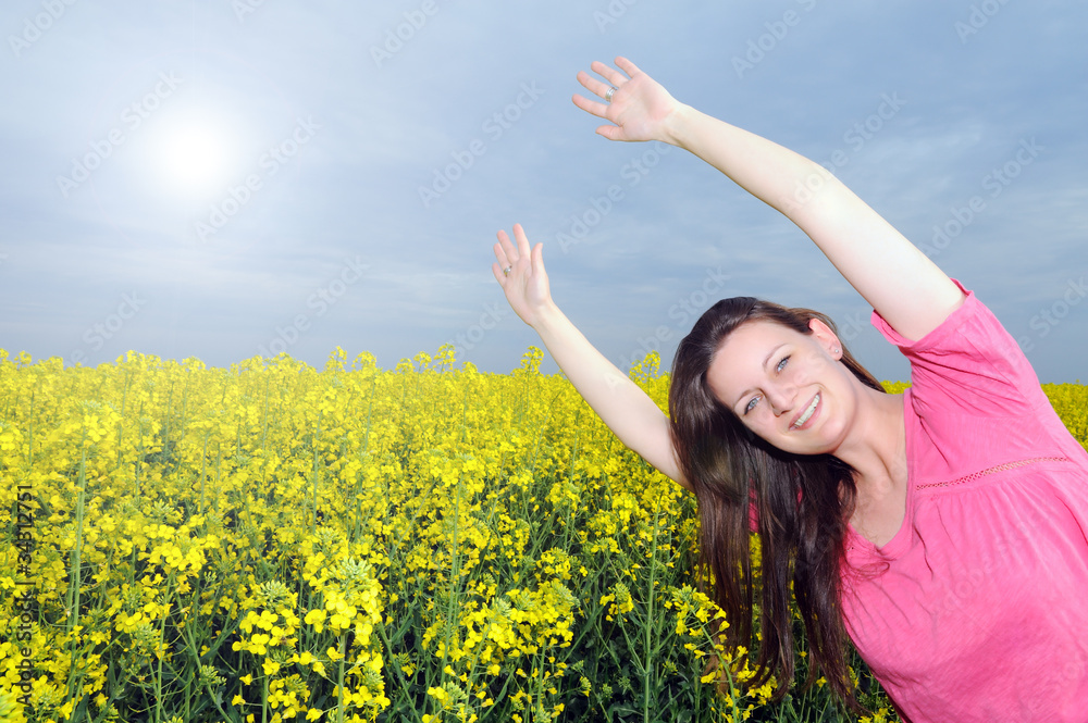 Beautiful young brunette woman relaxing on the meadow Beautiful young brunette woman relaxing on the meadow