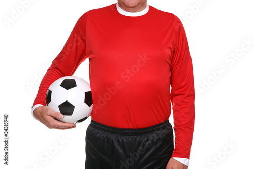 Football player holding ball isolated.