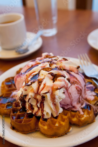 Waffles with ice cream and whipped cream