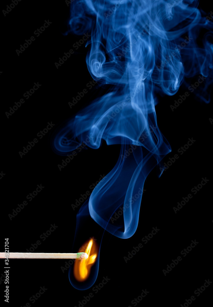 Green headed match starts to smoulder Green headed match starts to smoulder
