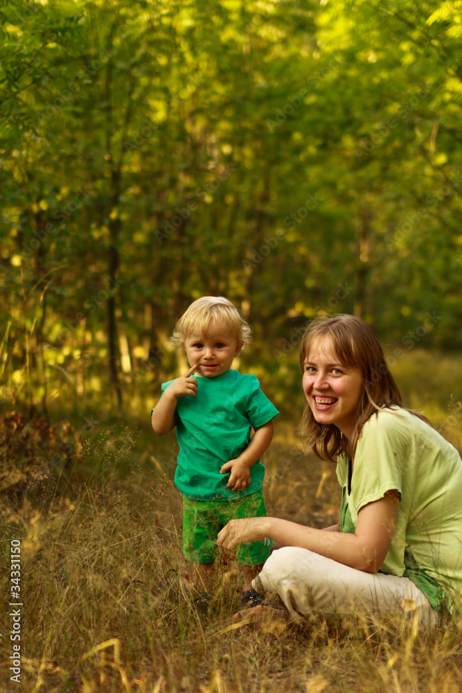 Mom and thoughful baby in nature