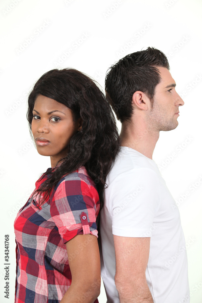 Man and woman back to back bulking Man and woman back to back bulking