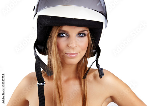 Sexy woman with a white motrcycle helmet and surprised expressio photo