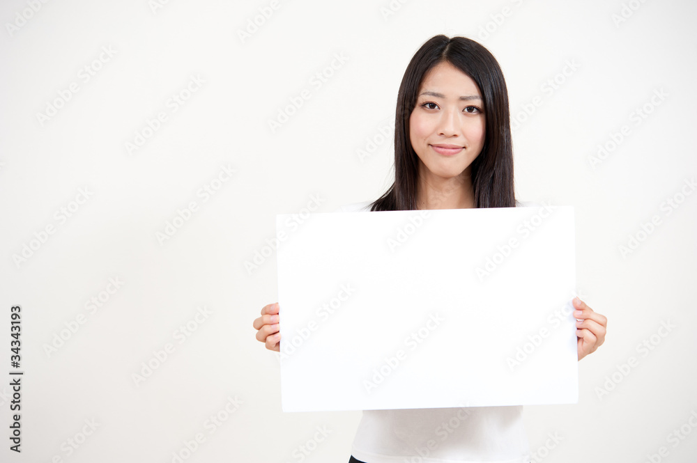 beautiful asian woman holding a blank whiteboad beautiful asian woman holding a blank whiteboad